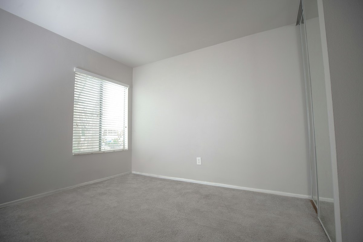 Original bedroom before AI staging